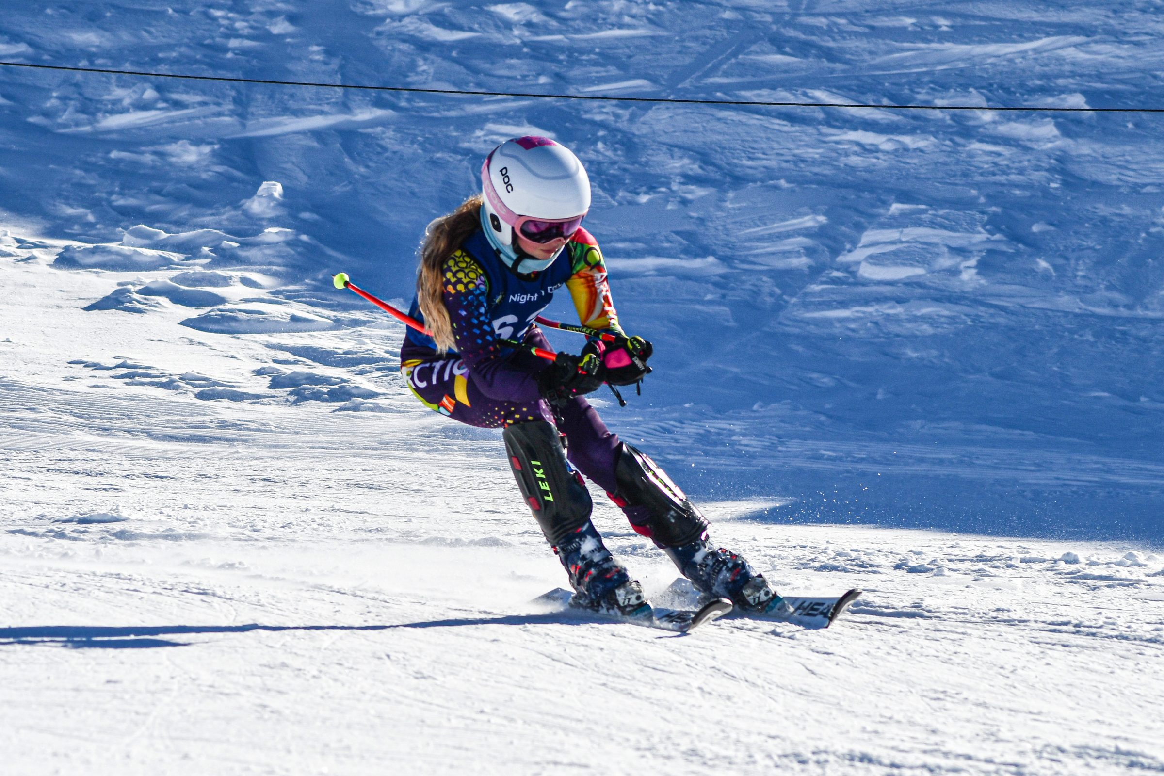 Briar mid giant slalom turn at Cardrona, winter light across the snow