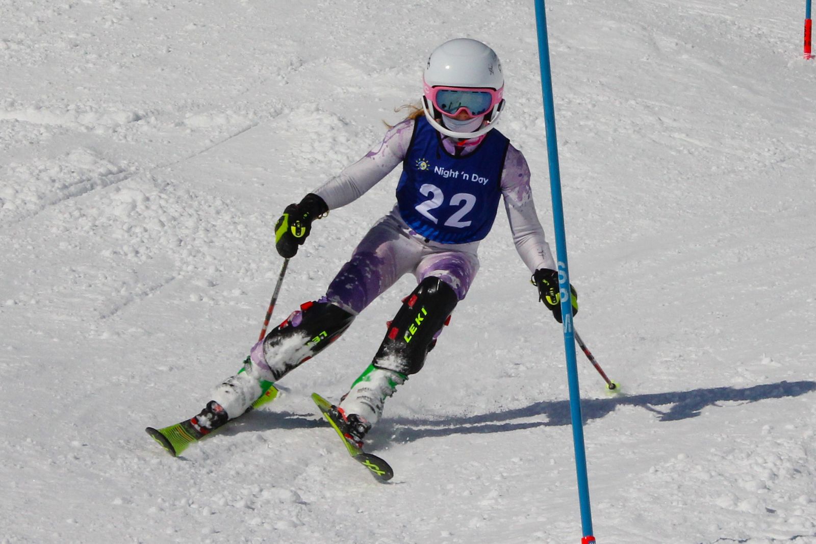 Briar arcing past a red slalom gate